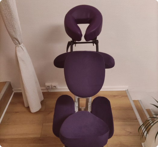 Chaise ergonomique utilisée pour une séance de amma assis